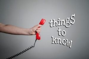 Arm Holding Out a Phone with the Words "Things to Know" Coming Out of the Speaker