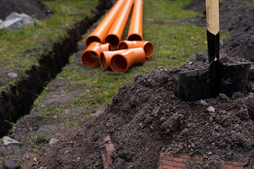 Repiping materials next to a trench