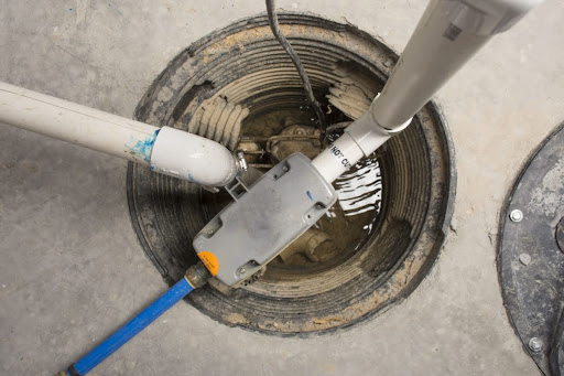 Birds eye view of sump pump being installed.